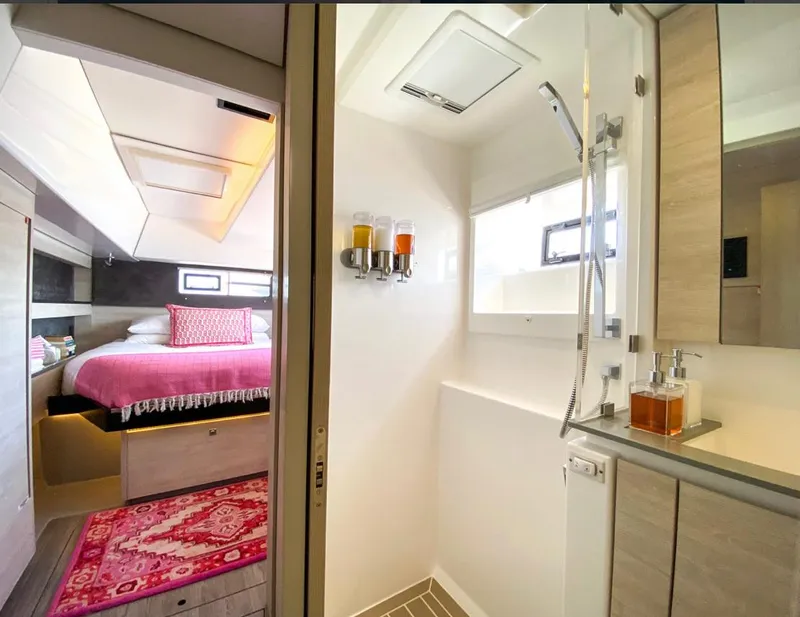 Slide: The Image of Luxurious interior of Leopard 50 yacht, bedroom and bathroom, year 2020. - 31