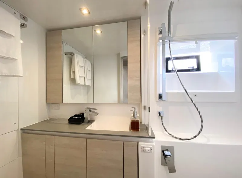 Slide: The Image of Modern bathroom in Leopard 50, 2020 model, featuring mirror and shower. - 38