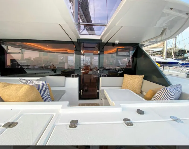 Slide: The Image of Leopard 50 Yacht 2020 with luxurious outdoor seating and cushions. - 4