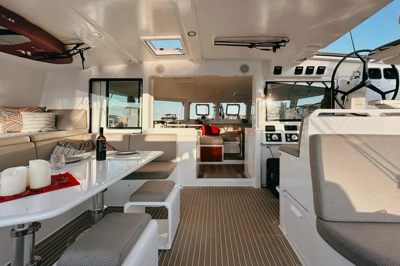 Slide: The Image of Luxurious interior of 2022 Balance 526 yacht with modern seating and dining area. - 16