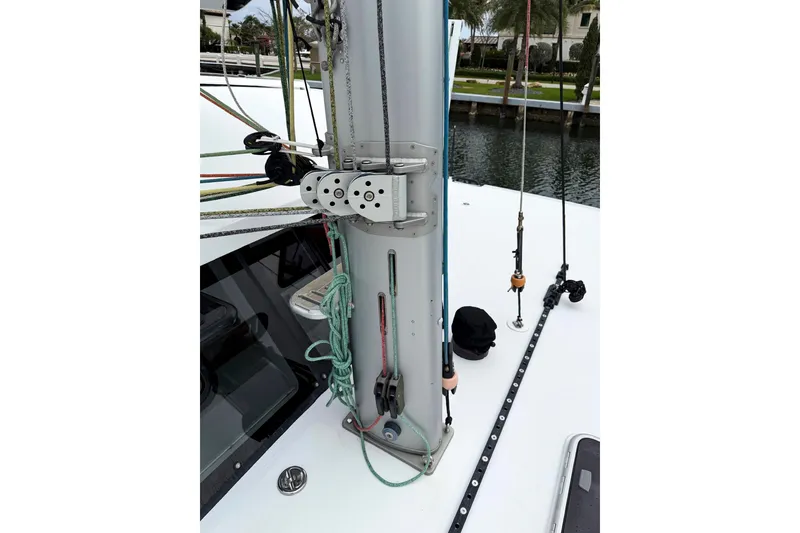 Slide: The Image of Sailboat deck with rigging and mast, Balance 526, 2022 model, docked by waterfront. - 25