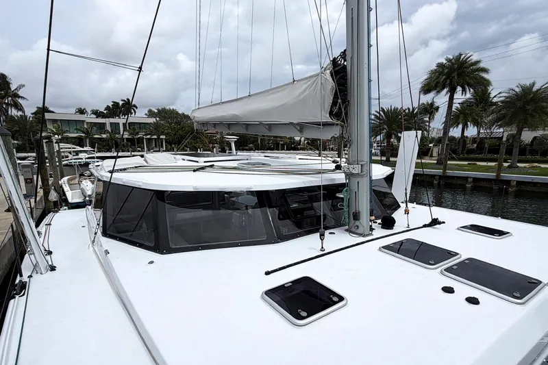Slide: The Image of 2022 Balance 526 catamaran docked, featuring sleek design and modern amenities. - 38
