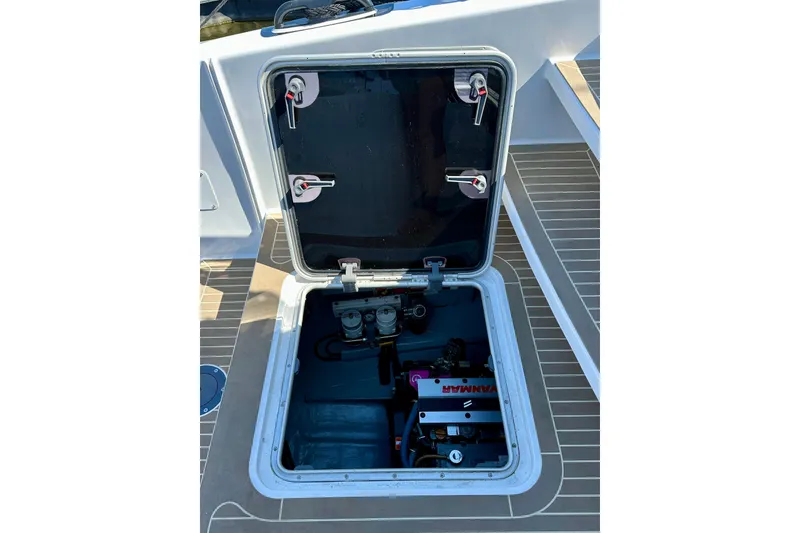 Slide: The Image of Open hatch on Balance 526 yacht, revealing engine compartment, 2022 model. - 39
