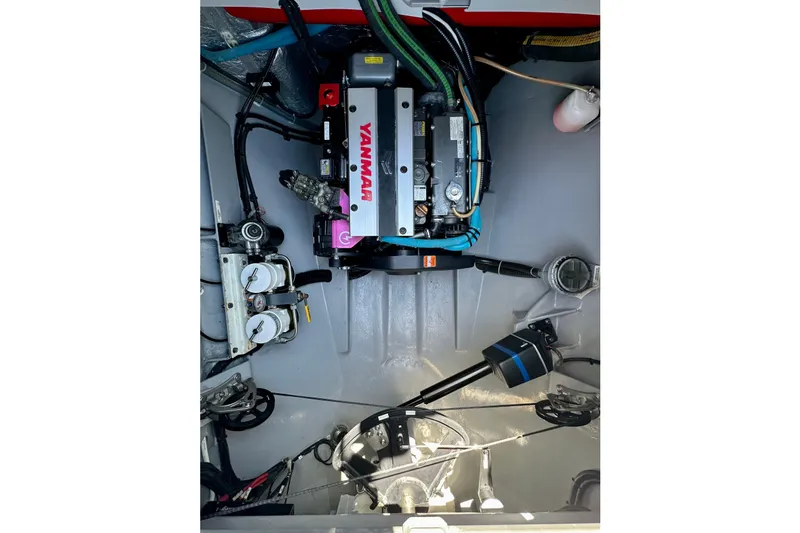 Slide: The Image of Engine compartment of a 2022 Balance 526 yacht featuring a Yanmar engine. - 42