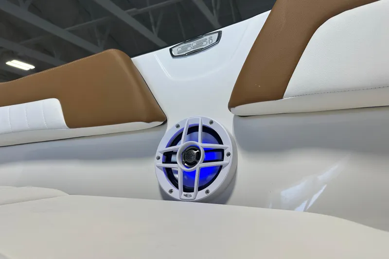Slide: The Image of Chaparral 23 SSi 2026 boat with blue-lit speaker. - 13