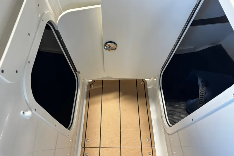 Slide: The Image of Interior of 2026 Chaparral 23 SSi with wooden flooring. - 15