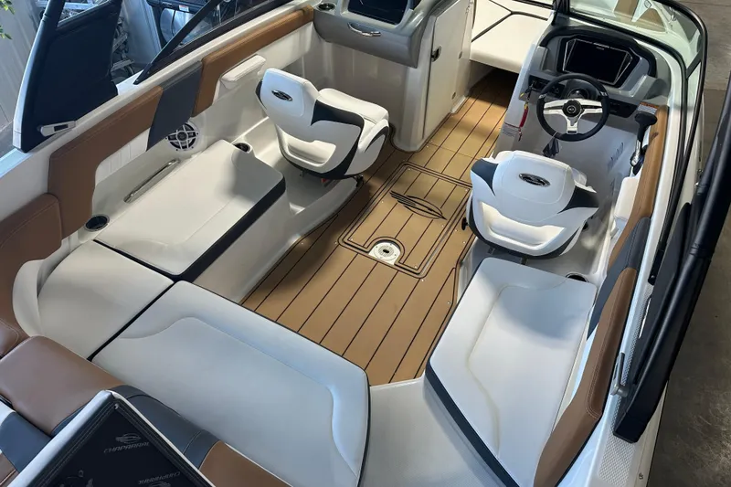 Slide: The Image of Interior of 2026 Chaparral 23 SSi with modern seating and steering wheel. - 4