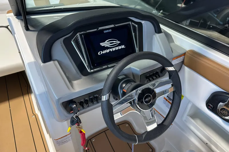 Slide: The Image of Chaparral 23 SSi 2026 helm with steering wheel and display. - 8