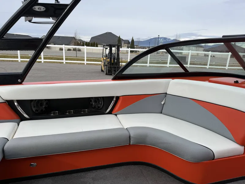 Slide: The Image of Interior of a 2015 Moomba Outback V boat with seating area. - 11