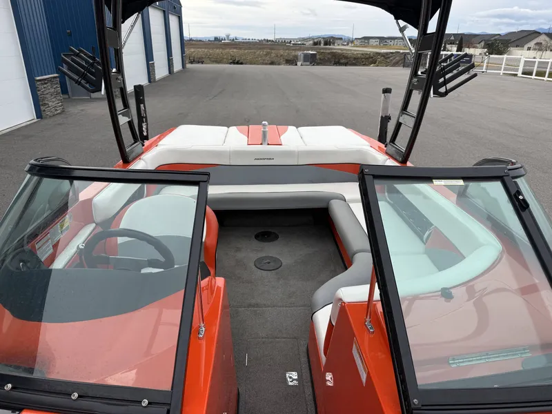 Slide: The Image of 2015 Moomba Outback V boat with open cockpit and seating. - 14