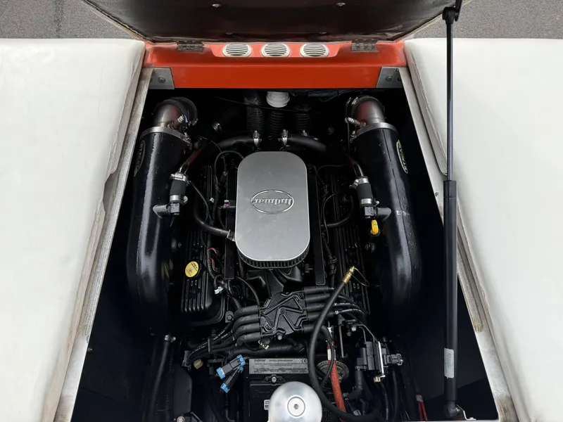 Slide: The Image of Engine compartment of a 2015 Moomba Outback V boat. - 18
