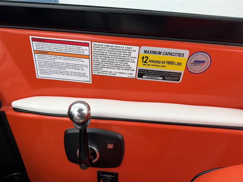 Slide: The Image of 2015 Moomba Outback V boat capacity label, 12 persons or 1600 lbs. - 9