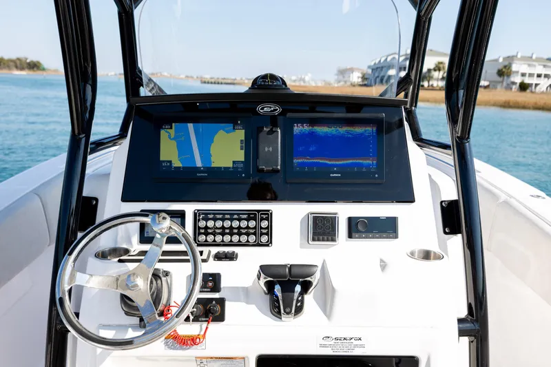 Slide: The Image of 2023 Sea Fox 288 Commander dashboard with navigation and control systems. - 21