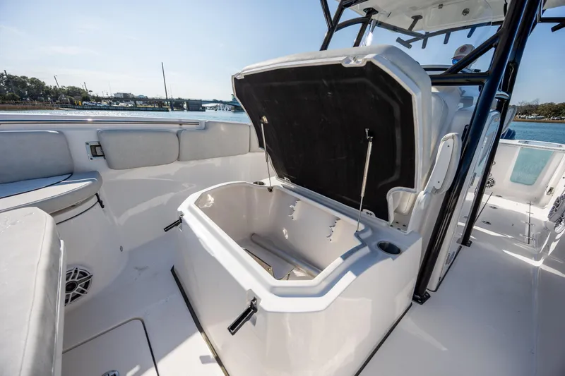 Slide: The Image of 2023 Sea Fox 288 Commander boat interior with open storage compartment. - 28