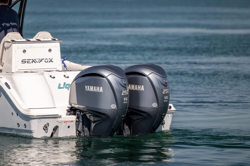 Slide: The Image of 2023 Sea Fox 288 Commander with twin Yamaha 250 V6 engines on water. - 3