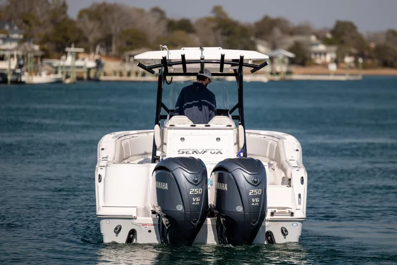 Slide: The Image of 2023 Sea Fox 288 Commander boat with dual Yamaha 250 engines on water. - 4