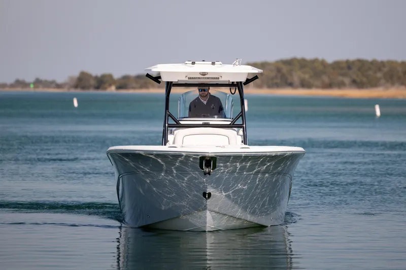 Slide: The Image of 2023 Sea Fox 288 Commander boat cruising on calm water. - 8