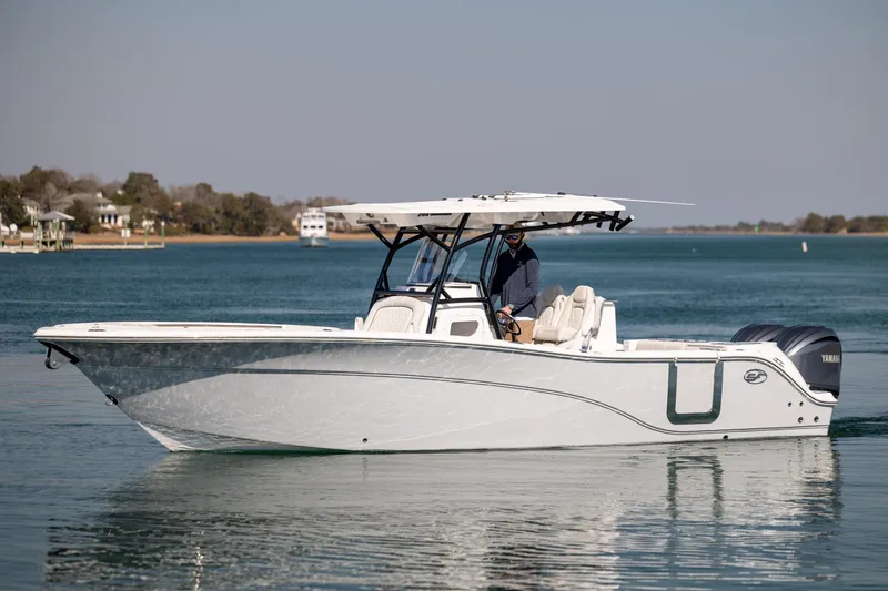 Slide: The Image of 2023 Sea Fox 288 Commander boat cruising on calm waters. - 9