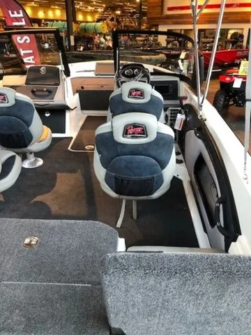 Slide: The Image of Interior view of 2026 Ranger 1850MS boat with gray seating. - 11