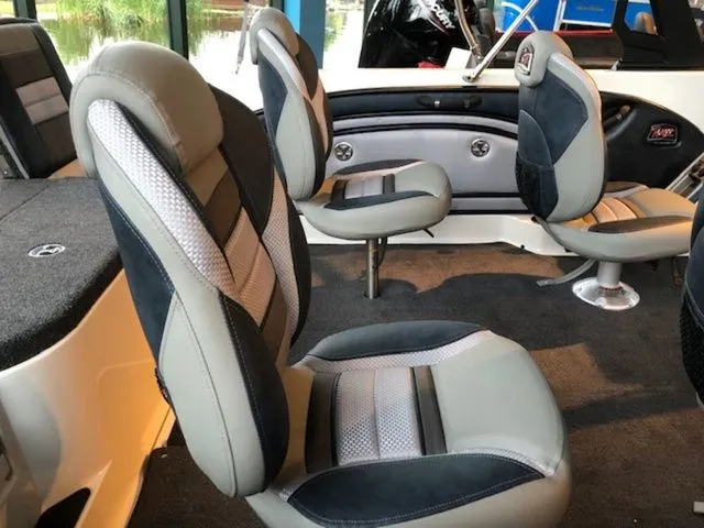 Slide: The Image of Interior of 2026 Ranger 1850MS boat with cushioned seats. - 14