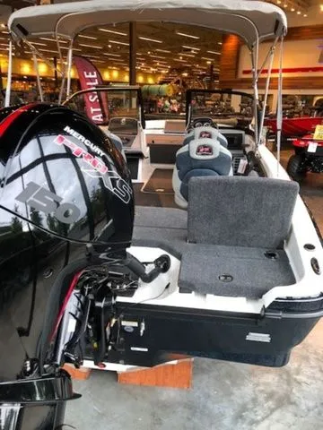 Slide: The Image of 2026 Ranger 1850MS boat with Mercury 150 engine in showroom. - 5