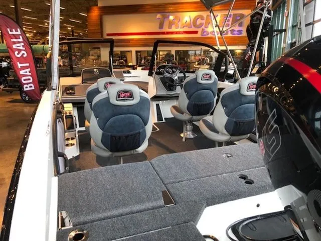 Slide: The Image of Interior view of 2026 Ranger 1850MS boat in a showroom. - 7