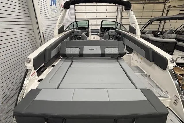 Slide: The Image of 2026 Chaparral SSX 8 boat interior with sleek seating and modern design. - 11