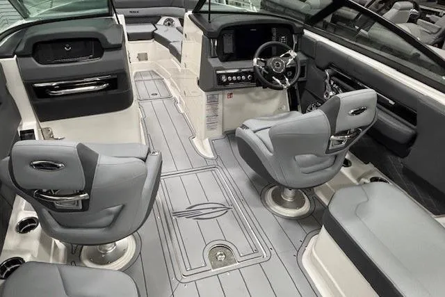 Slide: The Image of Interior of 2026 Chaparral SSX 8 boat with modern seating and dashboard. - 26