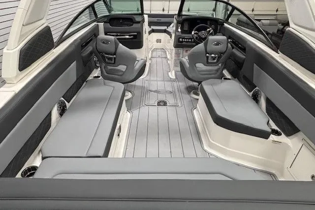 Slide: The Image of Interior of 2026 Chaparral SSX 8 boat with sleek gray seating and modern design. - 30