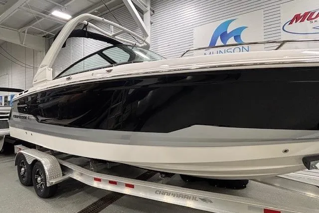Slide: The Image of 2026 Chaparral SSX 8 boat on trailer in showroom setting. - 32