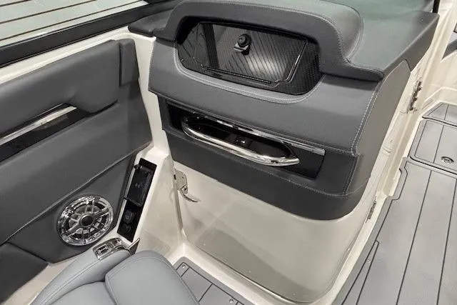 Slide: The Image of Interior of 2026 Chaparral SSX 8 boat, featuring sleek design and modern amenities. - 7