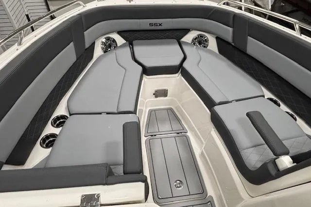 Slide: The Image of 2026 Chaparral SSX 8 boat interior with gray seating and sleek design. - 8