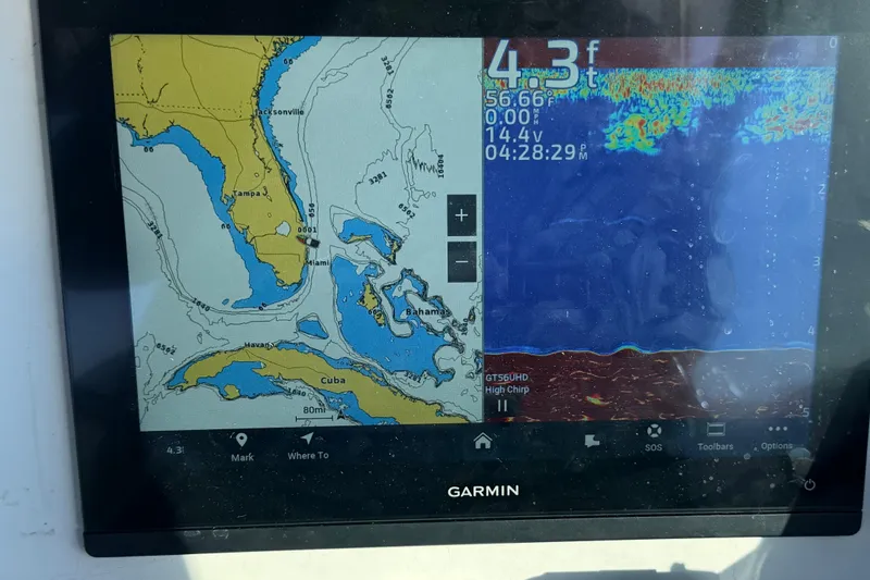 Slide: The Image of Garmin marine GPS display showing navigation map and sonar on Wellcraft 270 Coastal O/B, 2000 model. - 15