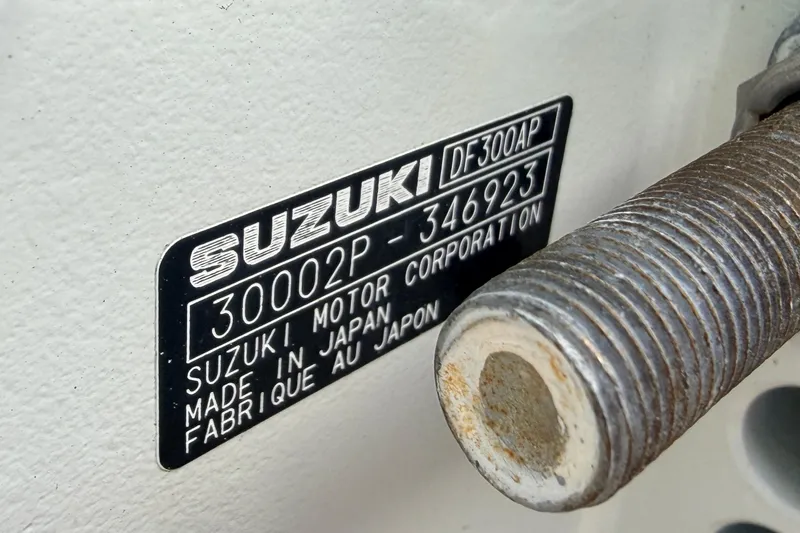 Slide: The Image of Close-up of Suzuki DF300AP engine label on 2000 Wellcraft 270 Coastal O/B boat. - 25
