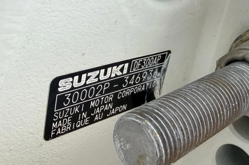 Slide: The Image of Suzuki DF300AP engine label on Wellcraft 270 Coastal O/B, 2000 model. - 26
