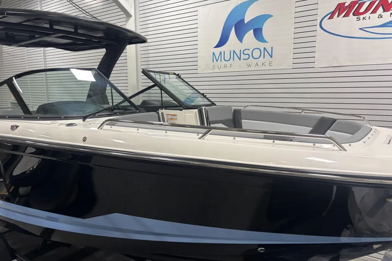Slide: The Image of 2026 Chaparral SSX 30 boat displayed at Munson Surf & Wake showroom. - 18