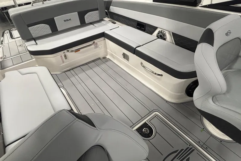 Slide: The Image of 2026 Chaparral SSX 30 boat interior with gray seating and sleek design. - 27