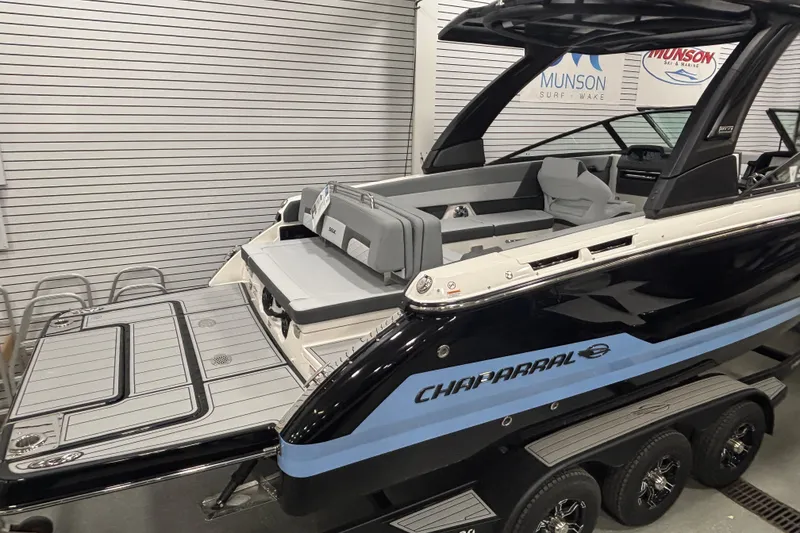 Slide: The Image of 2026 Chaparral SSX 30 boat in showroom, featuring sleek design and modern amenities. - 3