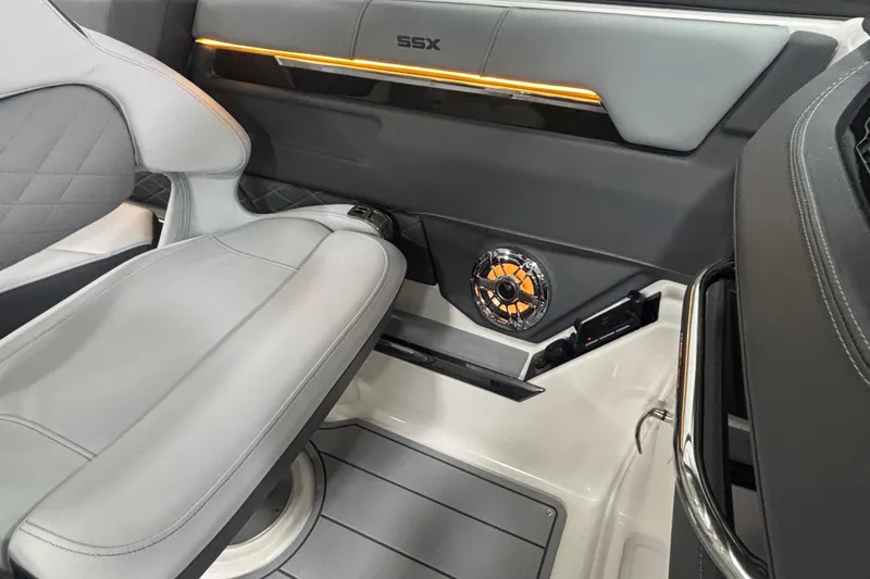 Slide: The Image of 2026 Chaparral SSX 30 boat interior with sleek seating and modern speaker system. - 40