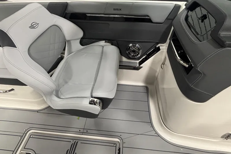 Slide: The Image of 2026 Chaparral SSX 30 boat interior with sleek seating and modern design. - 27