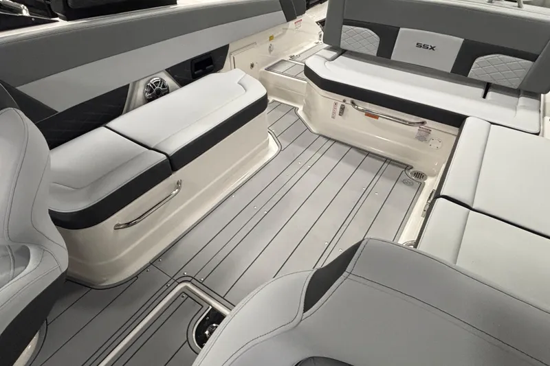 Slide: The Image of 2026 Chaparral SSX 30 boat interior with sleek gray seating and modern design. - 29