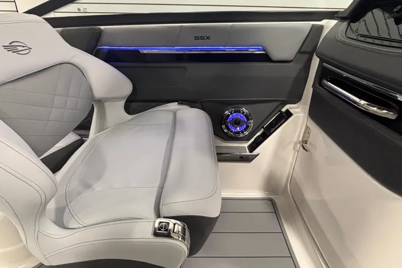 Slide: The Image of 2026 Chaparral SSX 30 interior with modern seating and illuminated speaker system. - 33