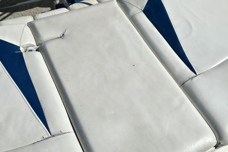 Slide: The Image of White and blue upholstery on 2008 Larson Senza 186 boat seat. - 14