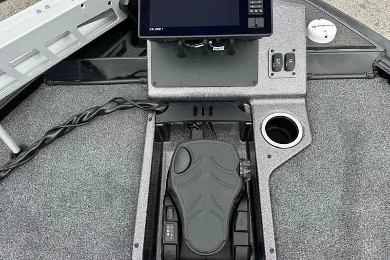 Slide: The Image of 2026 Ranger ALPHA 208 boat console with control panel and foot pedal. - 10