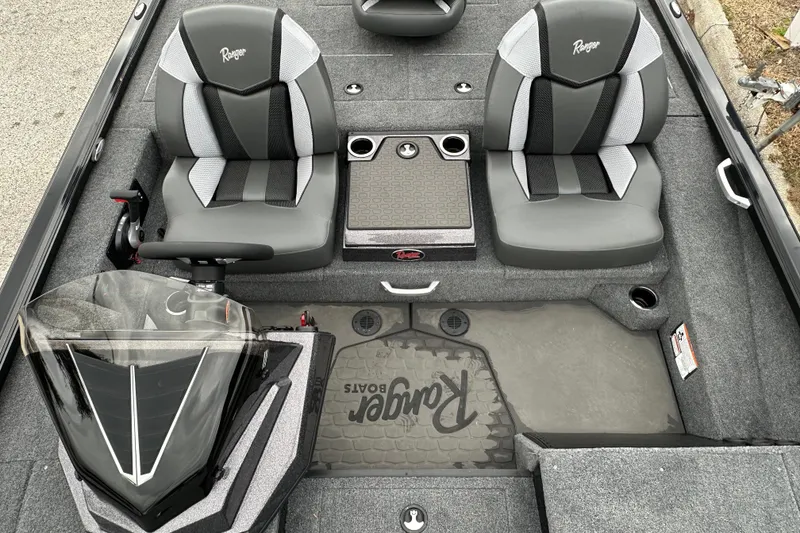 Slide: The Image of Interior of 2026 Ranger ALPHA 208 boat with dual seats and steering console. - 18