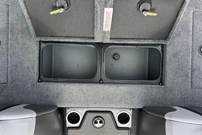 Slide: The Image of Interior of 2026 Ranger ALPHA 208 boat with storage compartments and cup holders. - 25