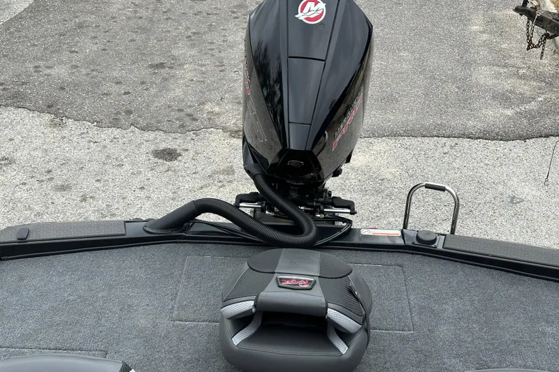 Slide: The Image of 2026 Ranger ALPHA 208 boat engine and seating on a textured surface. - 27