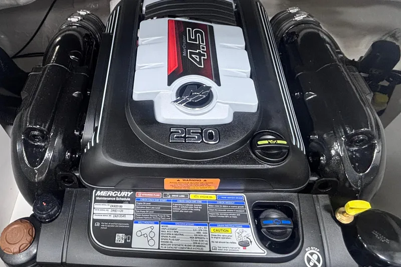 Slide: The Image of 2026 Chaparral 23 SSi boat engine, featuring a Mercury 4.5L 250 horsepower motor. - 24