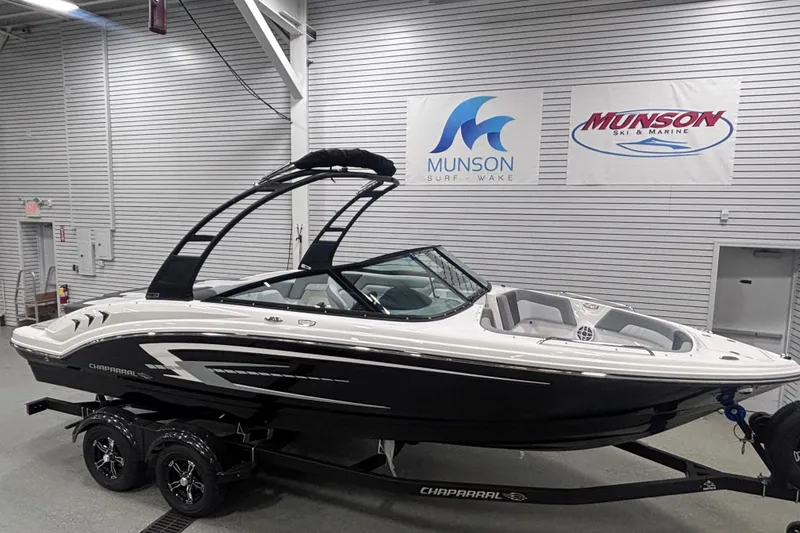 Slide: The Image of 2026 Chaparral 23 SSi boat on trailer in showroom, Munson Ski & Marine. - 5