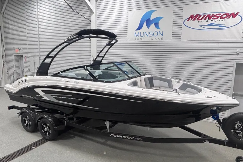Slide: The Image of 2026 Chaparral 23 SSi boat on trailer in showroom, Munson Ski & Marine. - 6